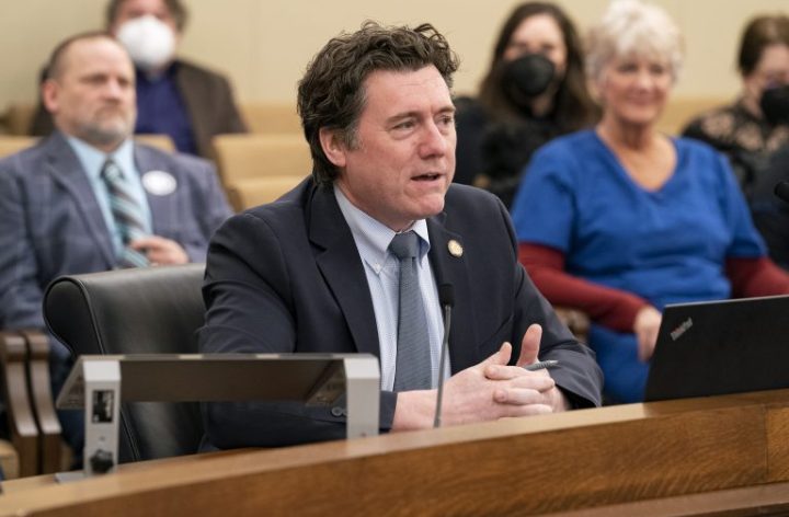 Aric Putnam speaking at a Senate committee hearing